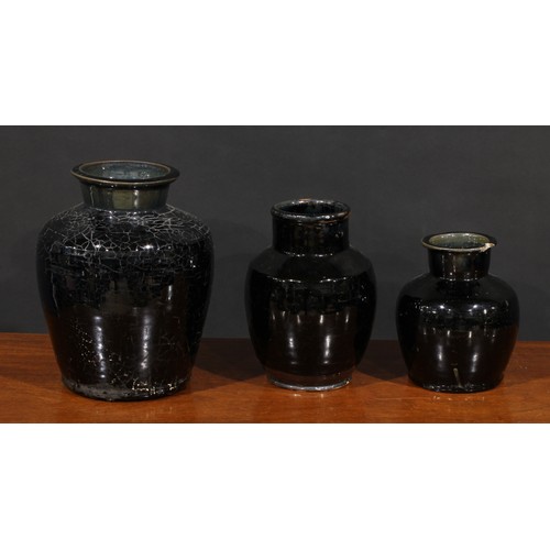 200 - A Chinese black glazed vase, possibly Henan, 28cm high; others, smaller (3)