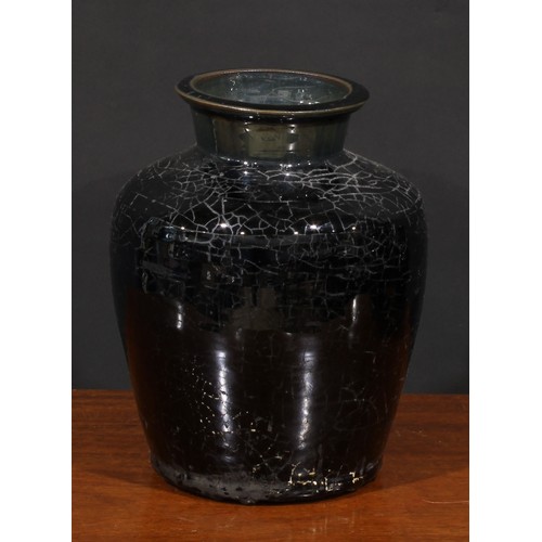 200 - A Chinese black glazed vase, possibly Henan, 28cm high; others, smaller (3)