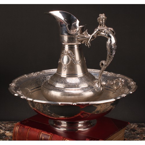 683 - A large 19th century French silver ewer and basin, engine turned and chased in the Grecian Revival t... 