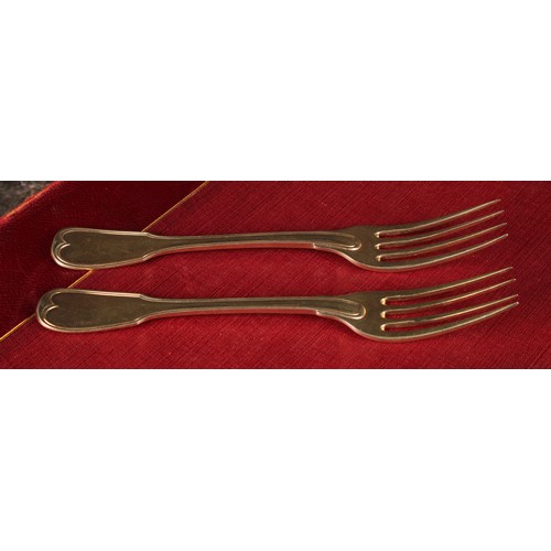 536 - A pair of early 19th century French silver-gilt Fiddle and Thread pattern table forks, 18cm long, Pa... 