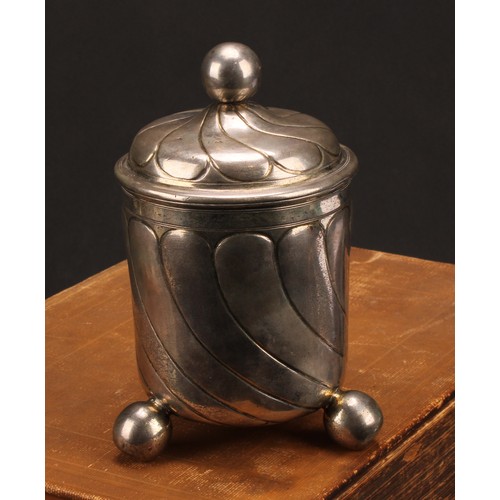 682 - A large 17th century German silver beaker and cover, wrythen fluted, ball finial and feet, gilt inte... 