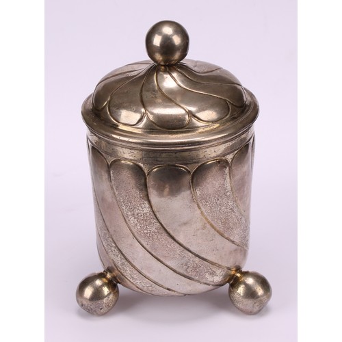 682 - A large 17th century German silver beaker and cover, wrythen fluted, ball finial and feet, gilt inte... 