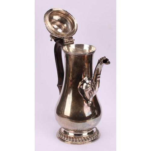 630 - A George III silver baluster coffee pot, hinged domed cover with fluted spire finial, scroll-capped ... 