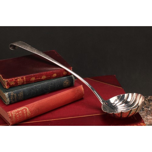 532 - A George III Irish silver Old English pattern soup ladle, shell bowl, curved terminal, 35cm long, Al... 