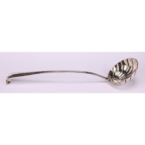 532 - A George III Irish silver Old English pattern soup ladle, shell bowl, curved terminal, 35cm long, Al... 