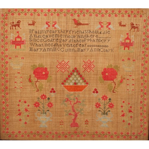 1310 - An early 19th century needlework sampler, Mary Ann McGunn and Mary Ann Clark, with verse 