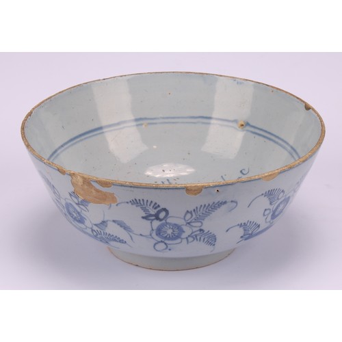 21 - An 18th century English Delft bowl, with motto, We Will Have More Before We Part, the exterior paint... 