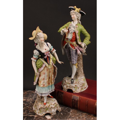 136 - A large pair of Sitzendorf figures, gallant and lady companion, he with tricorn hat, painted mark in... 