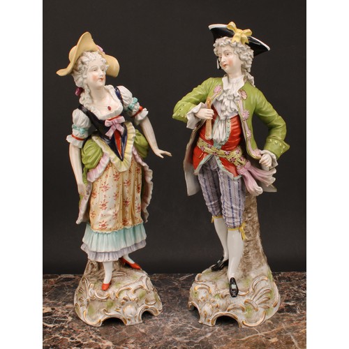 136 - A large pair of Sitzendorf figures, gallant and lady companion, he with tricorn hat, painted mark in... 