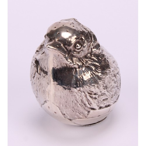 664 - A George V silver novelty mustard and pepper, each as a chick hatching from an egg, the mustard 7cm ... 