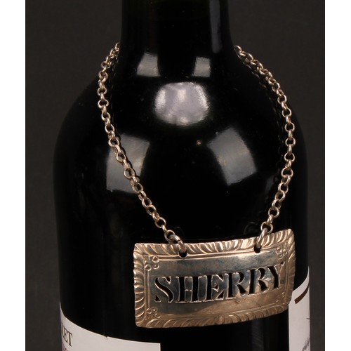 635 - A George III silver cut-out wine label, Sherry, gadrooned border, 5cm wide, Margaret Binley, London ... 