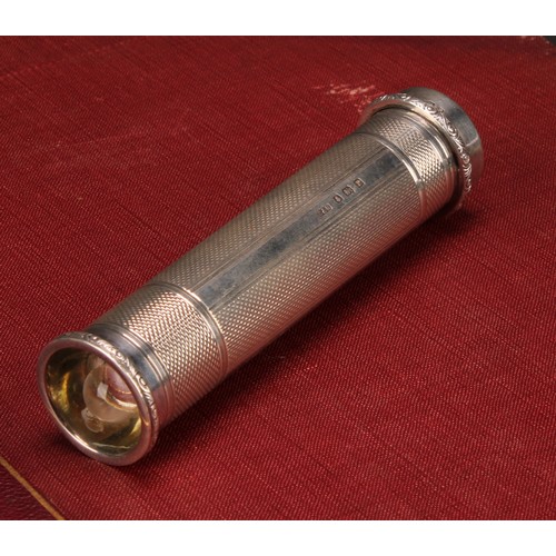 672 - A George VI silver pocket torch, engine turned, 11cm long, Crisford & Norris, Birmingham, 1939