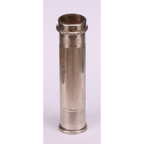 672 - A George VI silver pocket torch, engine turned, 11cm long, Crisford & Norris, Birmingham, 1939