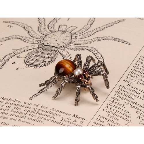 956 - A white and yellow gold coloured metal novelty brooch, as a spider, set with diamonds, rubies, a spl... 