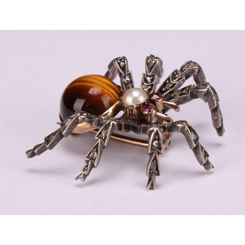 956 - A white and yellow gold coloured metal novelty brooch, as a spider, set with diamonds, rubies, a spl... 