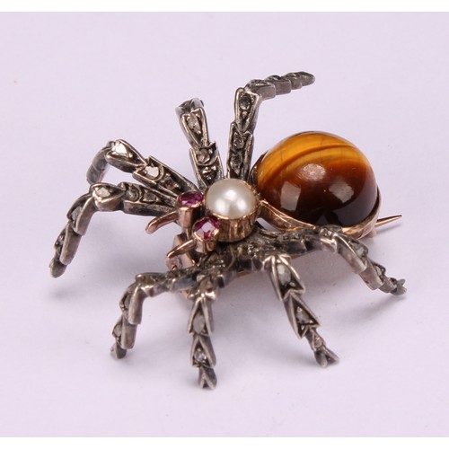 956 - A white and yellow gold coloured metal novelty brooch, as a spider, set with diamonds, rubies, a spl... 