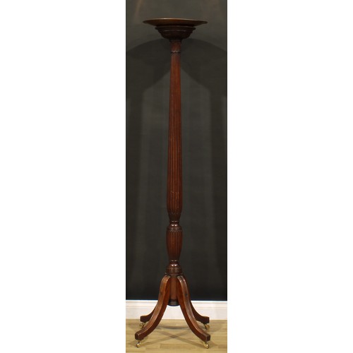 1300 - An Adam Revival mahogany torchere, fluted slender baluster pillar, sabre legs, brass casters, copper... 