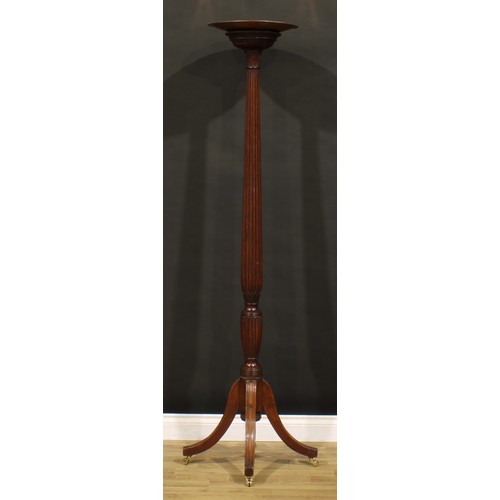 1300 - An Adam Revival mahogany torchere, fluted slender baluster pillar, sabre legs, brass casters, copper... 