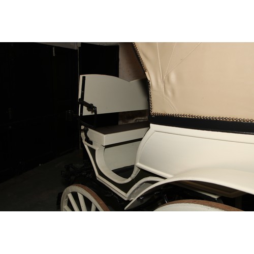 1473 - A 19th century horse drawn doctor's carriage, deep buttoned upholstery, renovated leather canopy, 20... 