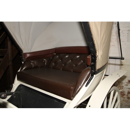 1473 - A 19th century horse drawn doctor's carriage, deep buttoned upholstery, renovated leather canopy, 20... 