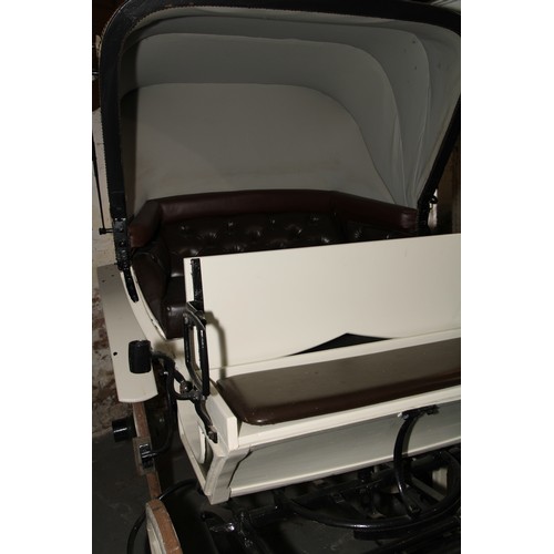 1473 - A 19th century horse drawn doctor's carriage, deep buttoned upholstery, renovated leather canopy, 20... 