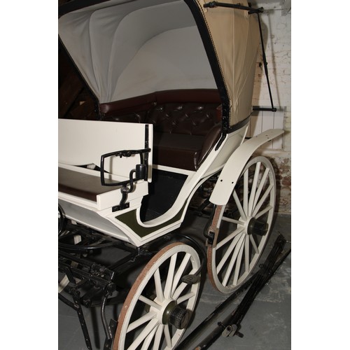 1473 - A 19th century horse drawn doctor's carriage, deep buttoned upholstery, renovated leather canopy, 20... 