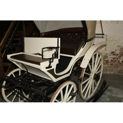 1473 - A 19th century horse drawn doctor's carriage, deep buttoned upholstery, renovated leather canopy, 20... 