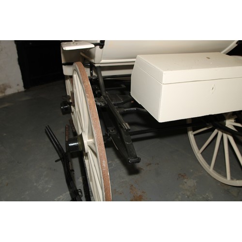 1473 - A 19th century horse drawn doctor's carriage, deep buttoned upholstery, renovated leather canopy, 20... 