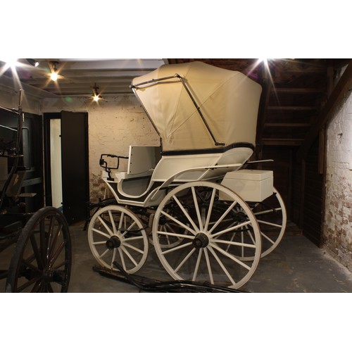 1473 - A 19th century horse drawn doctor's carriage, deep buttoned upholstery, renovated leather canopy, 20... 