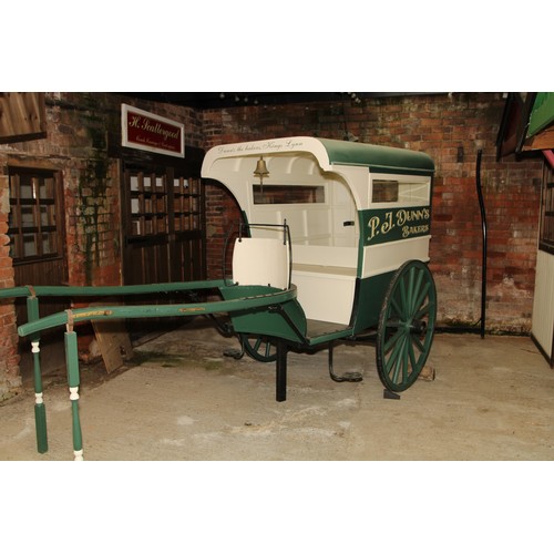 1478 - A late 19th/early 20th century grocer's cart, green and cream livery inscribed P J Dunn.s, Bakers, D... 