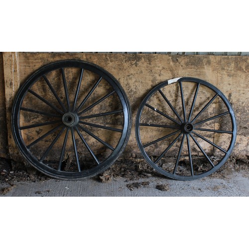 1481 - A large cart wheel, 120cm diam; another, 105cm diam (2)

***This lot is contained at a property in K... 