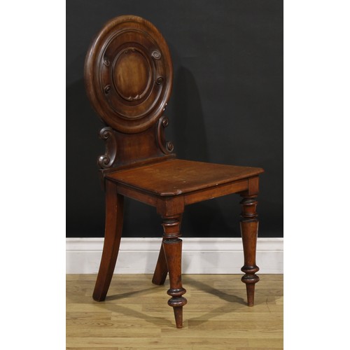 1342 - A pair of Victorian mahogany hall chairs, 88cm high, 44cm wide, 36cm deep, c.1860