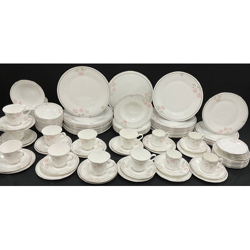 69 - An extensive Royal Doulton ‘Twilight Rose’ table service for eight including; twenty-four dinner pla... 