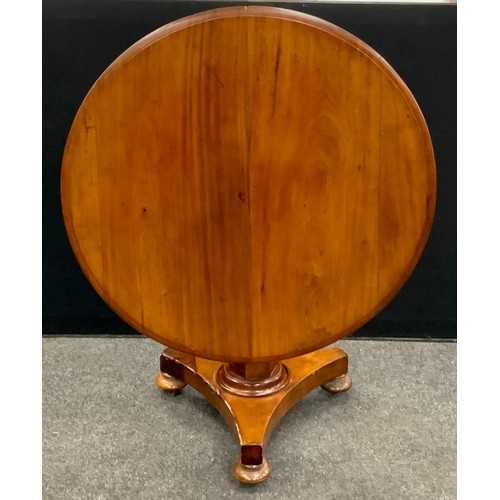 140 - A Victorian mahogany tilt-top breakfast table, circular top, tapered hexagonal support, tri-form bas... 