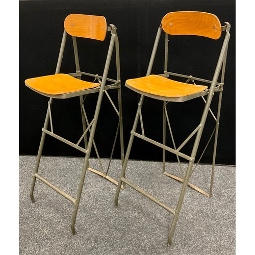 143 - A Pair of mid 20th century folding draughtsmans’ or counter chairs, 114cm high x 43cm wide, (2).