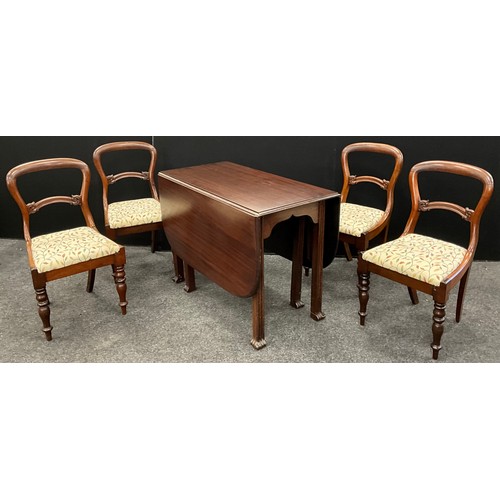 146 - A set of four Victorian mahogany balloon back dining chairs, and a drop leaf mahogany dining table, ... 