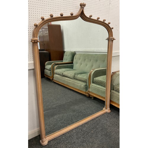 154 - A Gothic revival carved oak arch-top over-mantel mirror, 155cm high x 116cm wide.