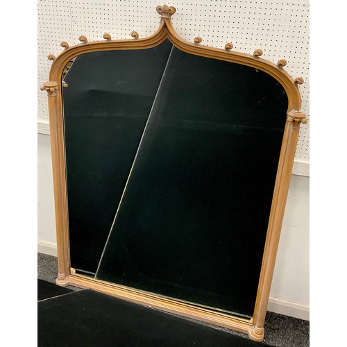 154 - A Gothic revival carved oak arch-top over-mantel mirror, 155cm high x 116cm wide.