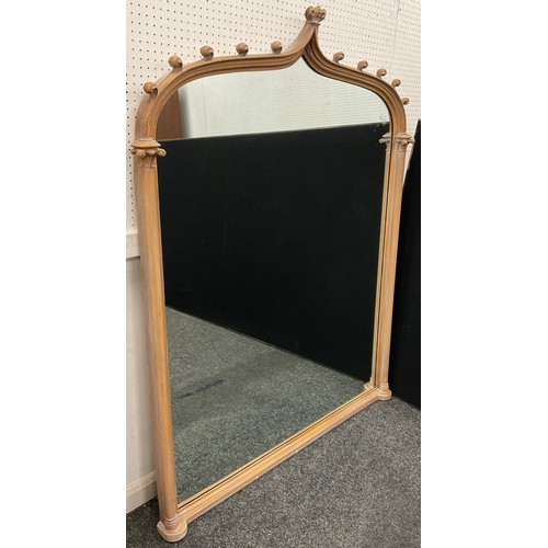 154 - A Gothic revival carved oak arch-top over-mantel mirror, 155cm high x 116cm wide.