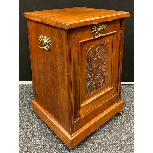 155 - A Victorian walnut carved front purdonium, 58cm x 38cm x 35cm.