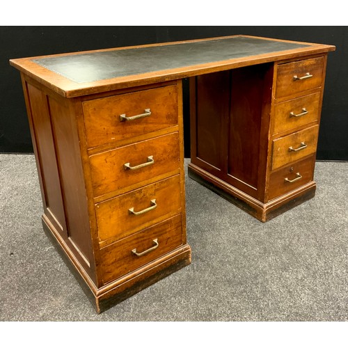 180 - A Victorian mahogany pedestal desk, inset leather writing surface, four short drawers to each pedest... 