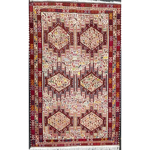 181 - A Kilim Soumak Shahsavan rug, with animal and lozenge panelled field, in tones or red, blue, cream, ... 