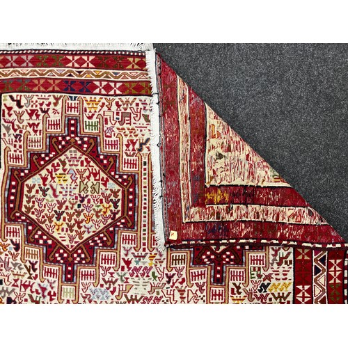 181 - A Kilim Soumak Shahsavan rug, with animal and lozenge panelled field, in tones or red, blue, cream, ... 