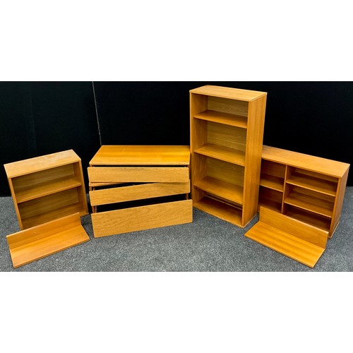 186 - A suite of Tapley 33 teak shelving, and drawer, modular furniture units - comprising three tier book... 