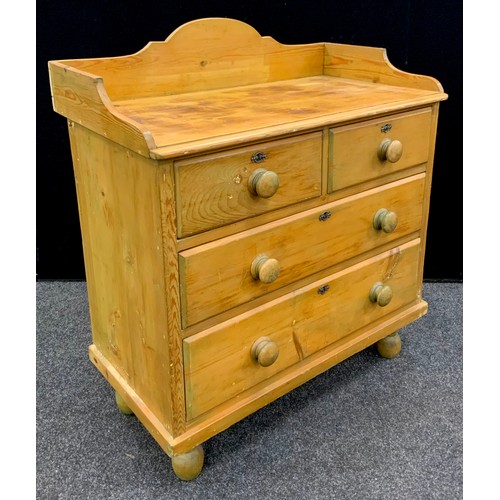 188 - A Victorian pine chest of drawers, three-quarter galleried top, above two short over two long gradua... 