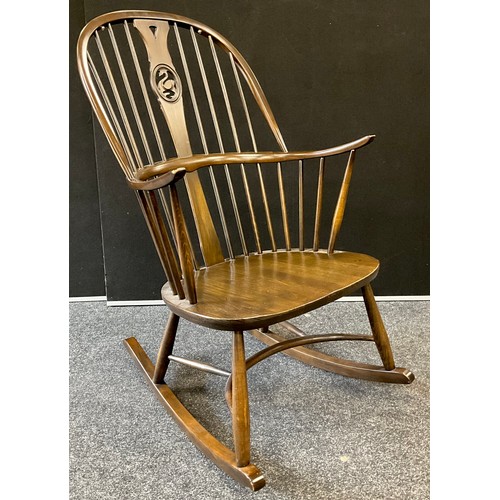 198 - An Ercol Windor Swan back elm and beech rocking chair, 106cm high, 62cm wide, 80cm deep, 40cm high t... 