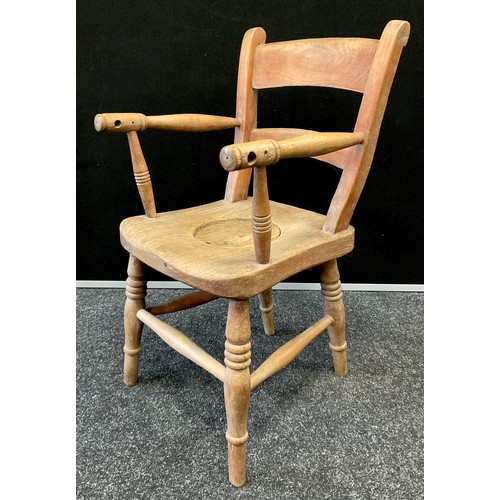 206 - A Childs Elm and beech plug seat commode chair,  turned arms and legs, 63cm high.