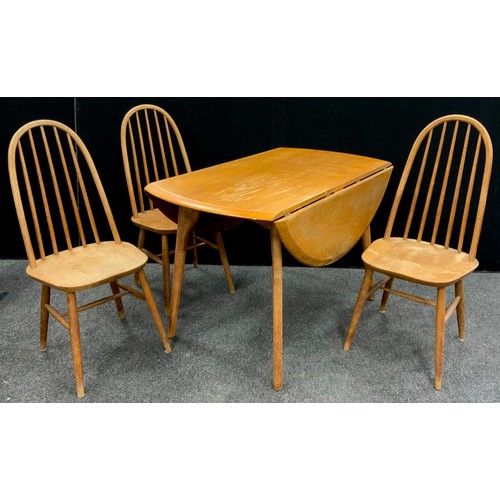 207 - An Ercol elm drop-leaf dining table, 74.5cm high x 112.5cm x 68cm (130cm with leaves extended);  thr... 