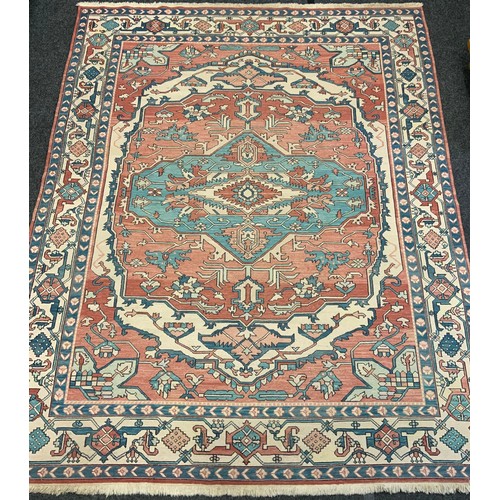 208 - A large middle-eastern Kilim type rug, with cross-chain stitch, geometric floral medallion within tr... 