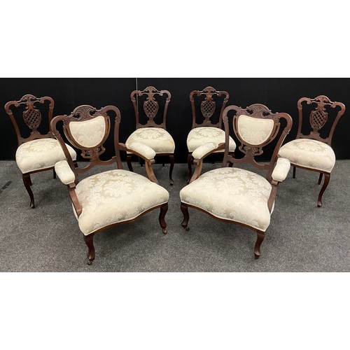 213 - A Victorian mahogany Salon suite, comprising a pair of armchairs, and set of four matching side chai... 